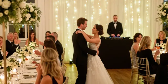hochzeit DJ berlin brandenburg celebration with couple dancing and DJ booth
